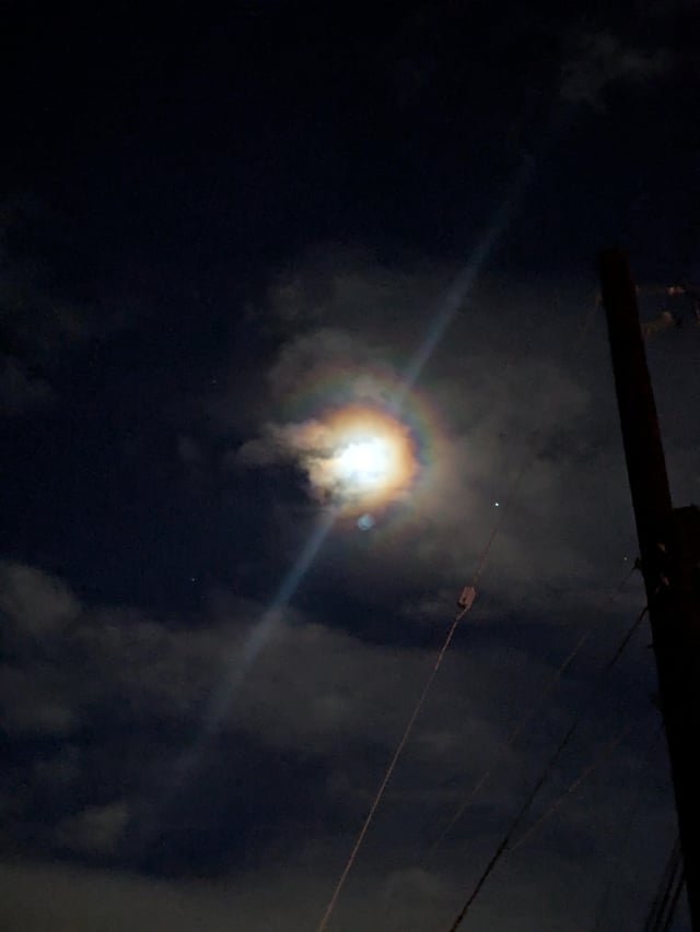There was a rainbow around the moon this evening (I heard it’s called a lunar corona?)
