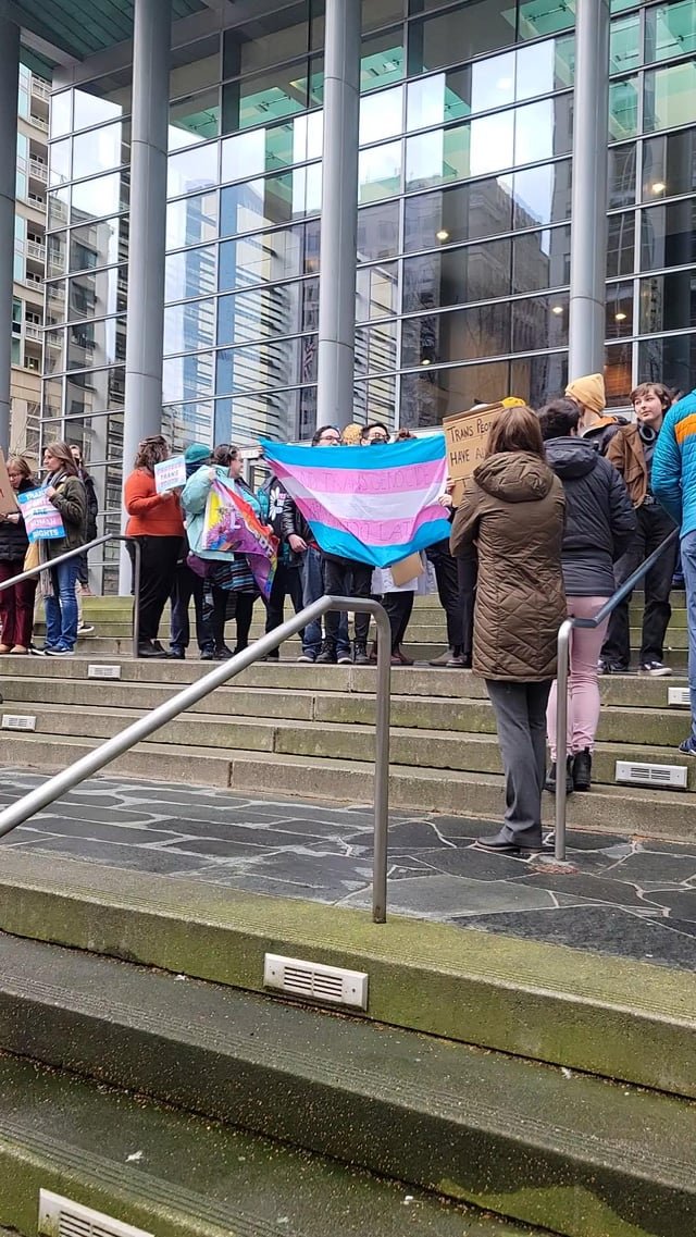 Pic of the group in front of the courthouse showing support for the restraining order against Trump’s executive order restricting gender affirming care in WA, OR, MN