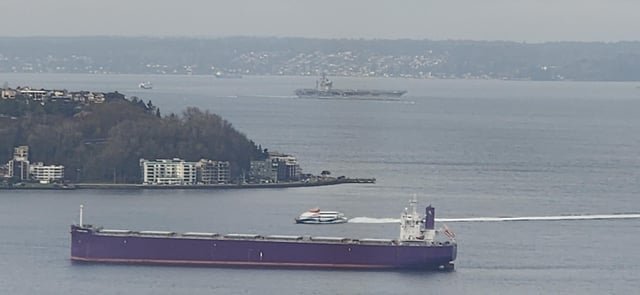Aircraft carrier USS Nimitz passing Seattle right now