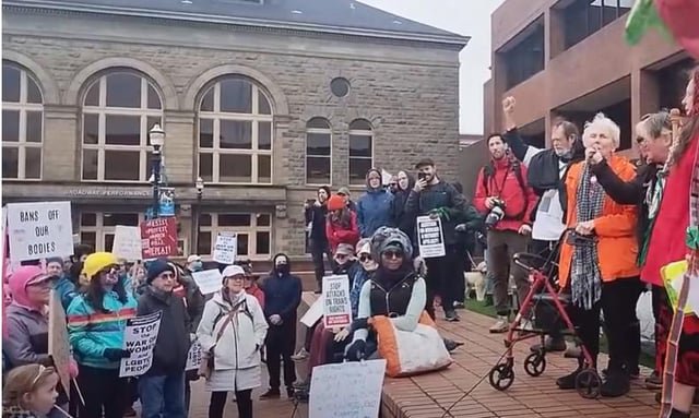 93 year old Woman Molly leads chants at Seattle Intl. Womens Day March