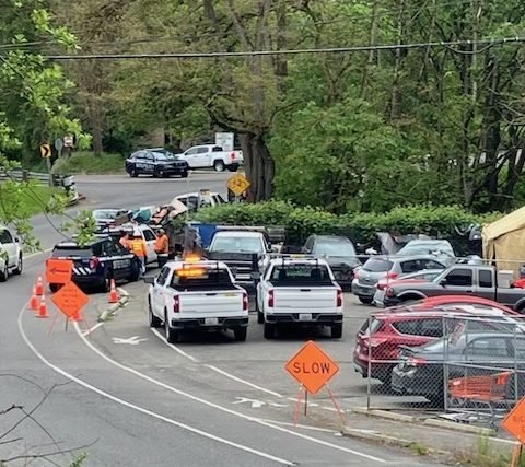 City cleanup crews at Longfellow Creek encampment site