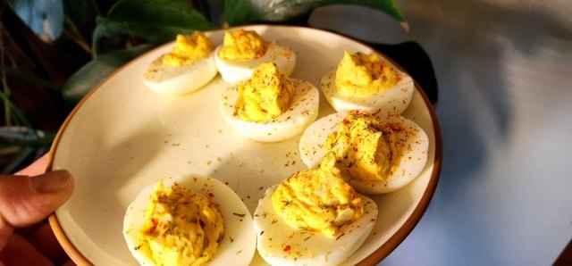 Guys, I know it’s nice outside so, I made ya’ll some deviled eggs. Take one and pass them down please.