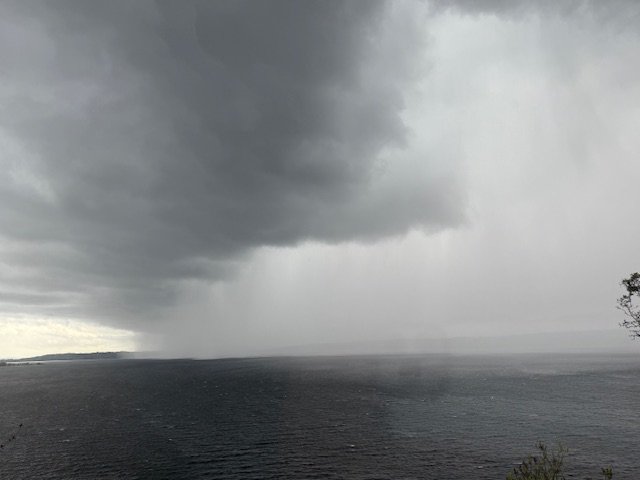 WEST SEATTLE WEATHER: From dark clouds to bright rainbow