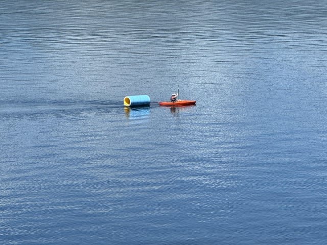 What is this kayaker doing on Lake Washington
