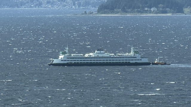 Ferry pushed by tug