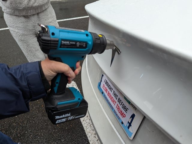 Free Tesla badge removal today at U Village