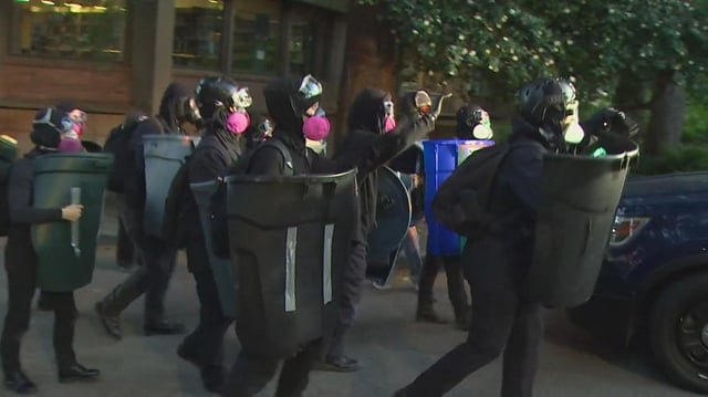 UW suspends, bans 21 students after protest
