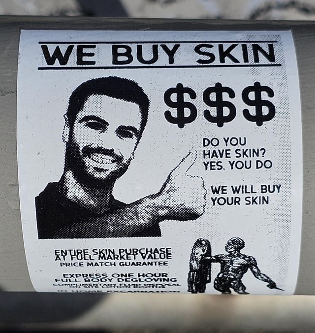 Sticker on Pine St overpass of I-5