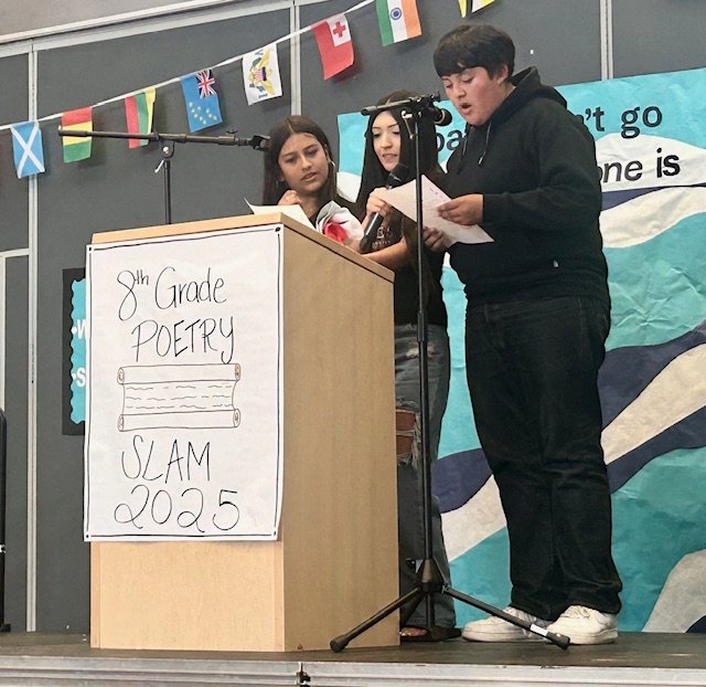 VIDEO: Students and guest poets dazzle at Denny International Middle School 8th-grade Poetry Slam