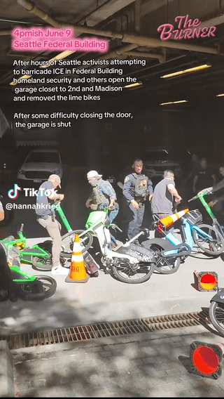 Hannah Krieg reports federal agents have started removing the improvised barricade blocking at least one garage entrance at the federal building