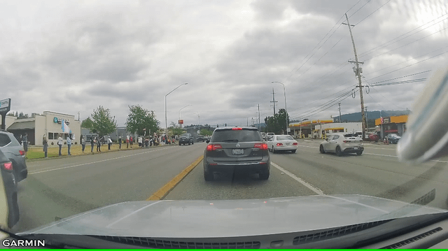 Great turn out for No Kings in Monroe! Also caught this guy swerve into the bus lane to roll coal at protesters.