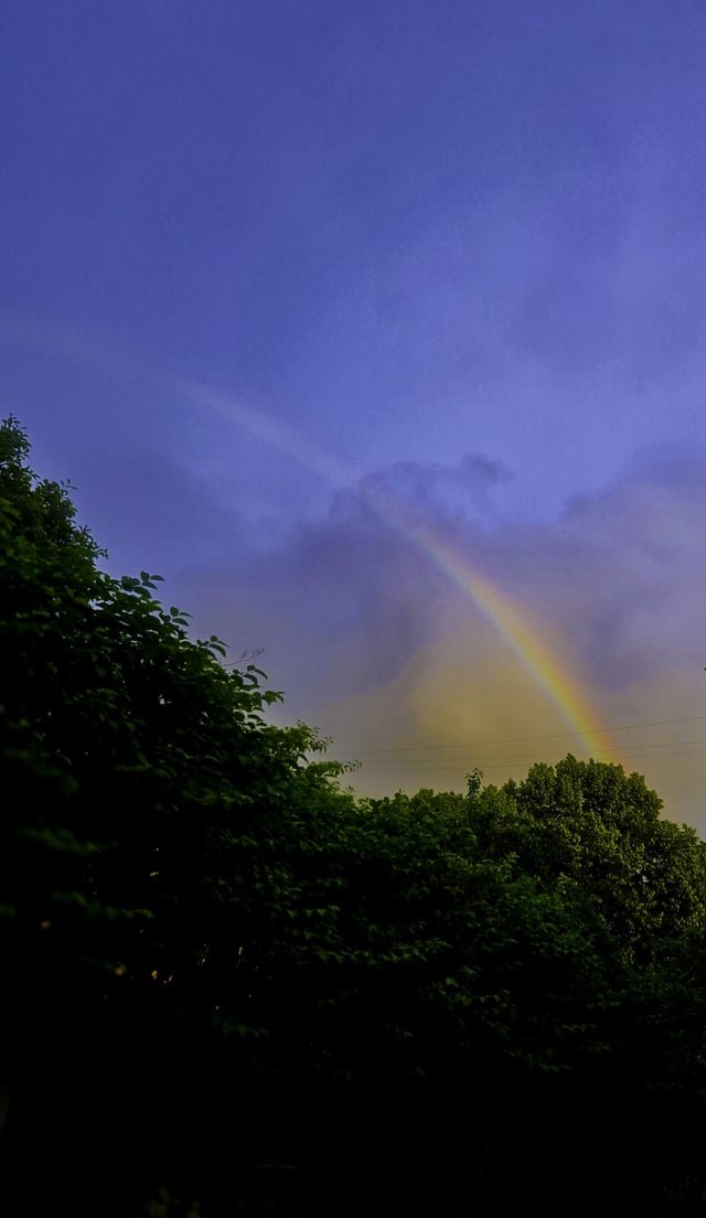 Happy little sunset rainbow showed up for just a couple minutes maybe