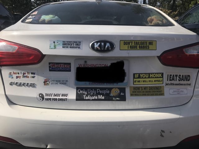 Car in Target parking lot with best bumper stickers I’ve ever seen