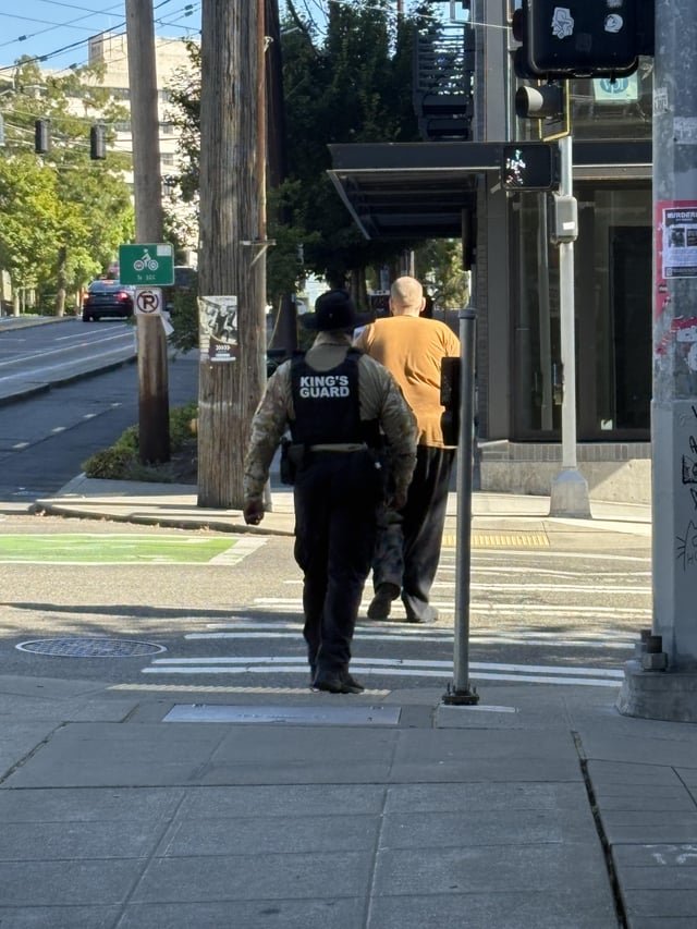 Does anyone know what this “King’s Guard” vest means?