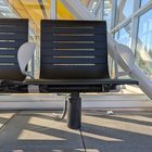 Why are chair at Lightrail station have some electric cables connecting to them?