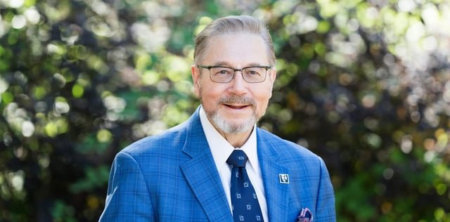 John Wilson, candidate for King County Executive, was arrested Wednesday after violating a restraining order for stalking and harassment