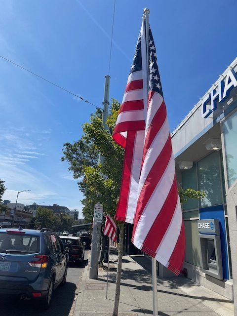 WEST SEATTLE HOLIDAY SCENE: Junction flag volunteers