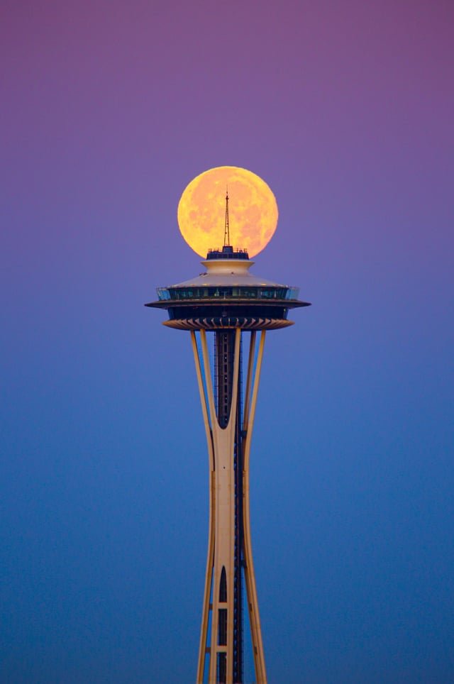 I Woke Up at 4AM Today to Capture the Buck Moon Balanced on the Space Needle During Twilight Hour.