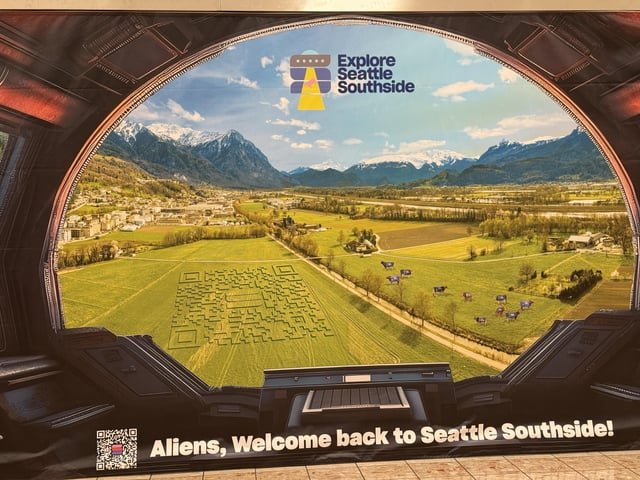 Why is a picture of Lichtenstein on this Explore Seattle Southside ad at Southcenter?