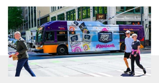 Gotta love the DOGE bus wraps