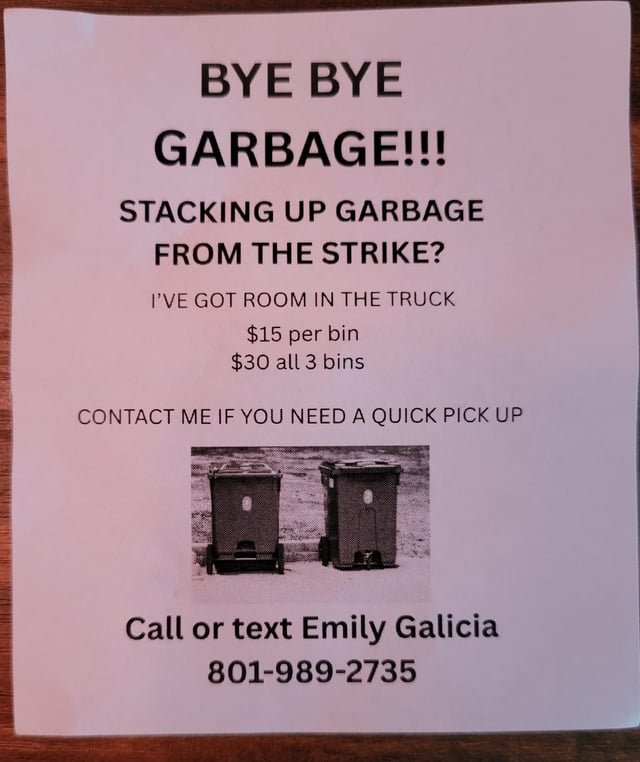 Local family helping with garbage pile up from strike