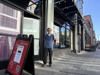 After damaging fire, Post Options has temporary new home in Capitol Hill’s ‘Christmas Dive Bar’