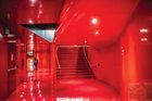 Seattle Central Library’s fabulous Red Hall, utilizing thirteen shades of red paint: