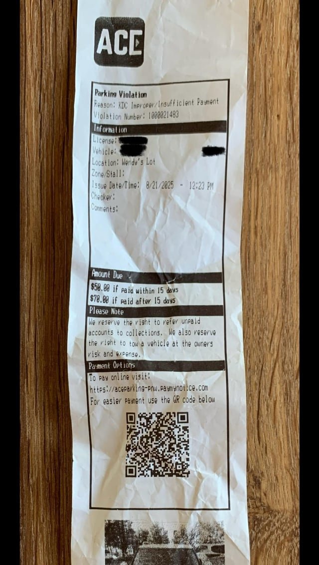 Need advice: Daughter got this parking ticket at Bellevue Way Wendy’s. Is it real or a scam?