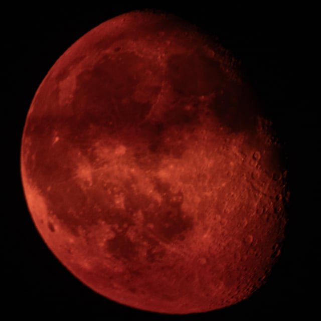 Tonight’s moon behind the smoke
