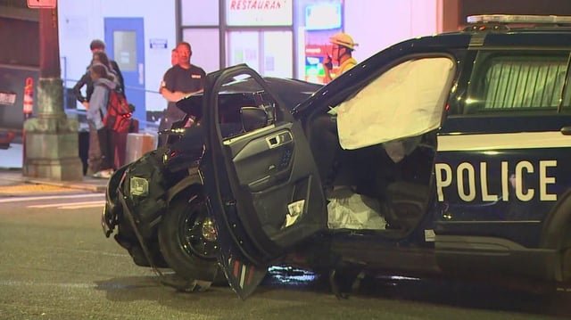 Seattle police officer ran red light before t-bone crash, Uber driver, passenger say
