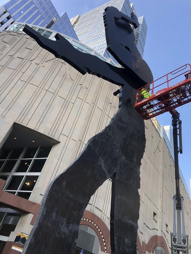 Not only is he not working today, the working man is also getting a fresh coat of paint!