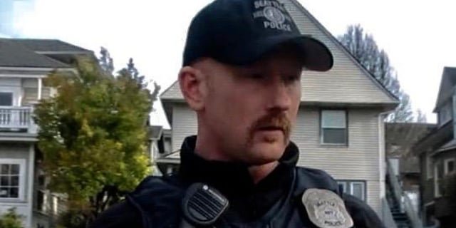 Seattle cop accused of head-butting fiancee down stairs, sexually abusing her