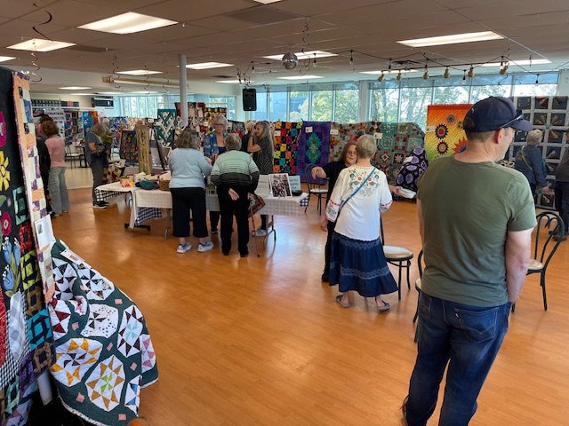 HAPPENING NOW: Stitches and stories at West Seattle Quilters’ showcase
