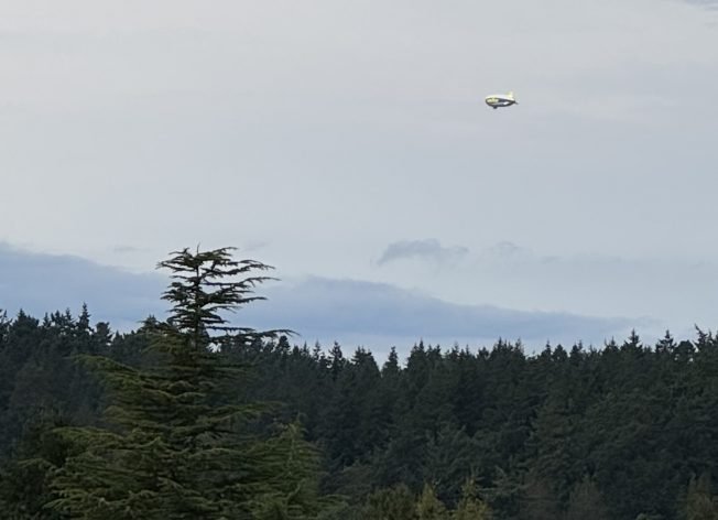 Another flyover: Goodyear Blimp seen above West Seattle