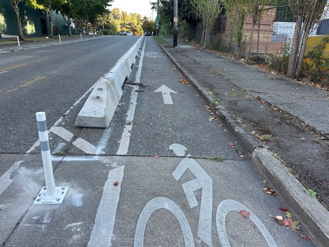 ROAD WORK: Barriers added to Yancy/Andover/28th bike lane