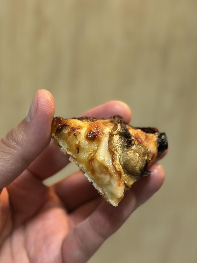 This slice was $8 at Big Mario’s