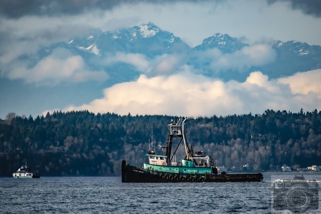 We live in a magical place. Olympic Mountains this morning from Alki Beach:
