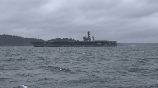 USS Nimitz meeting up with its tugs before heading into Rich Passage