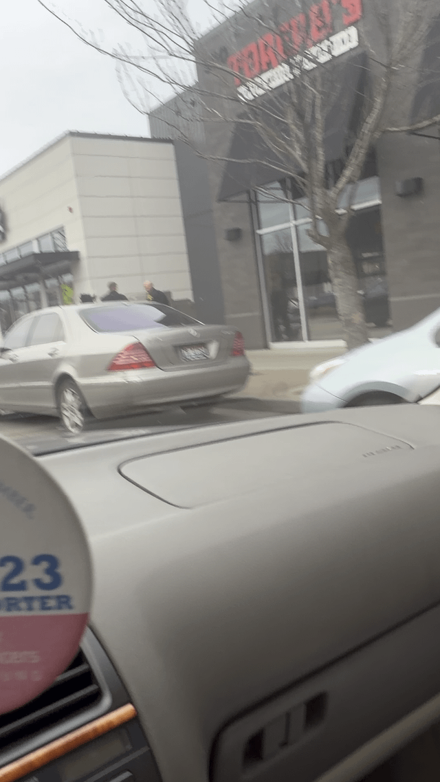 Random guy getting chased by a cop at The Landing in Renton