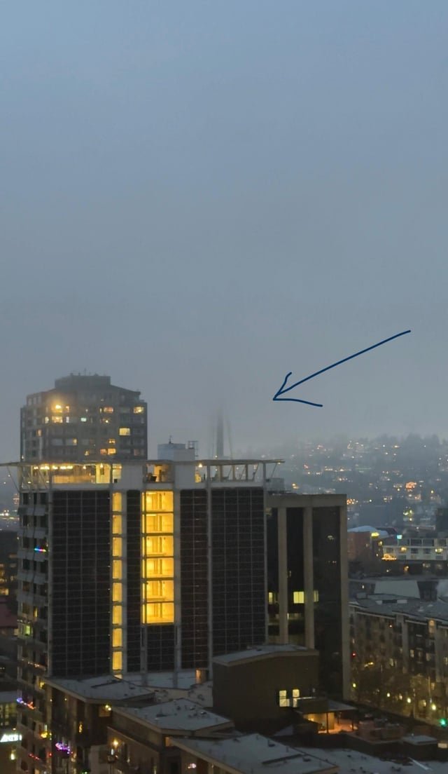 Space needle in the clouds