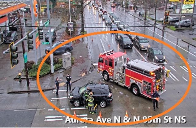 SPD officer ran a red and hit someone again