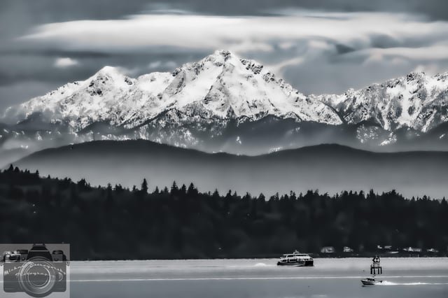 Mounts Ellinor and Washington between storms, from Alki Beach: