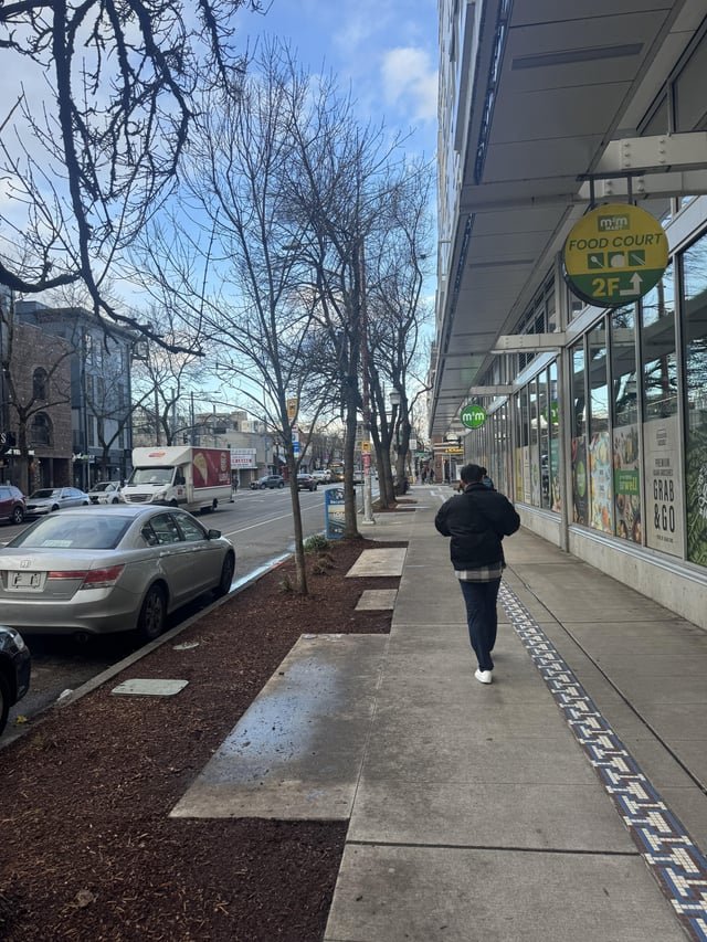 the benches outside of M2M mart on broadway have all been removed