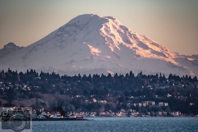 Her Majesty looking magnificent at sunset tonight, viewed from the deck of the Washington State Ferry Wenatchee out in Puget Sound: