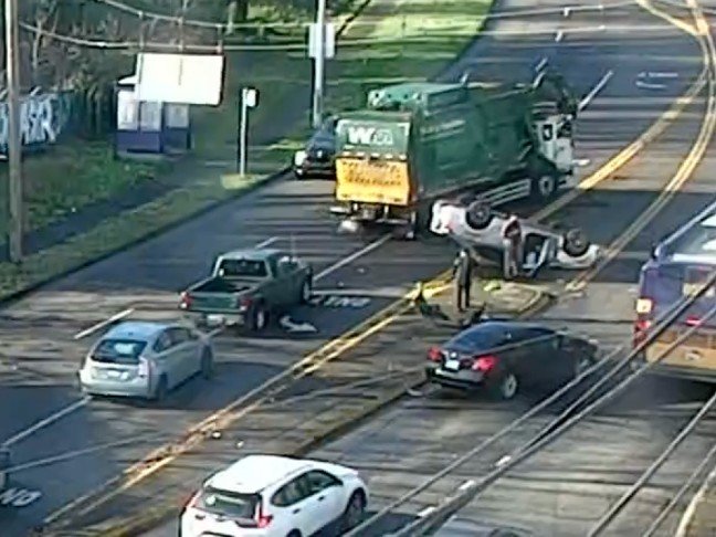 Flipped-car crash on Highland Park Way hill