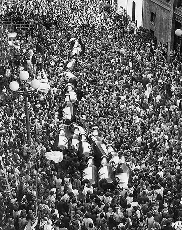 Mardi Gras Crowd and wild Rainier stampede, Fat Tuesday parade, Pioneer Square. February 19, 1977.