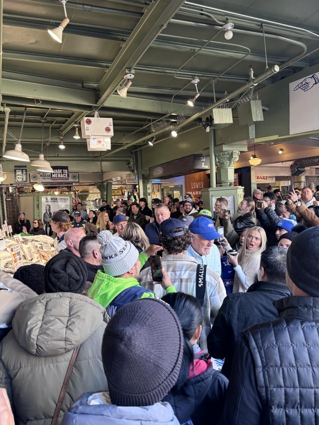 Terry Bradshaw at Pike Place this morning. (blue hat)