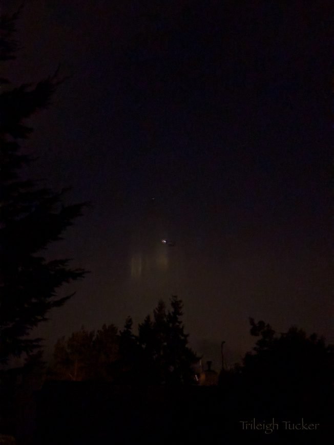 SEEN OVER WEST SEATTLE: Light pillars