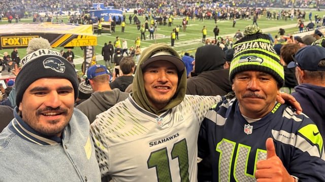 Delta Air Lines surprises father, son with Super Bowl tickets after viral Seahawks video