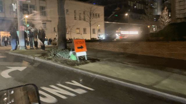 The line for Raising Cane’s goes down the block, around The Neptune and to the light rail station…